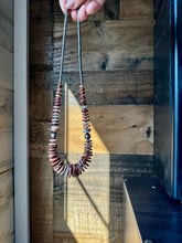 Load image into Gallery viewer, 22 Inch graduated necklace more purple and orange spiny and sterling silver pearls